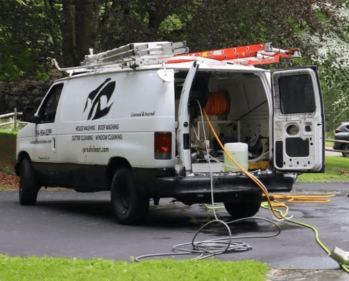 Rocky River Power Washing professionals cleaning commercial fleet in Rocky River